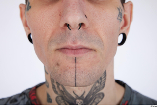 Photos Dio mouth nose tattoo 0001.jpg